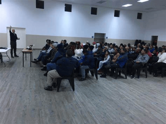 Chibase Consulting leading a community dialogue through people-first social facilitation